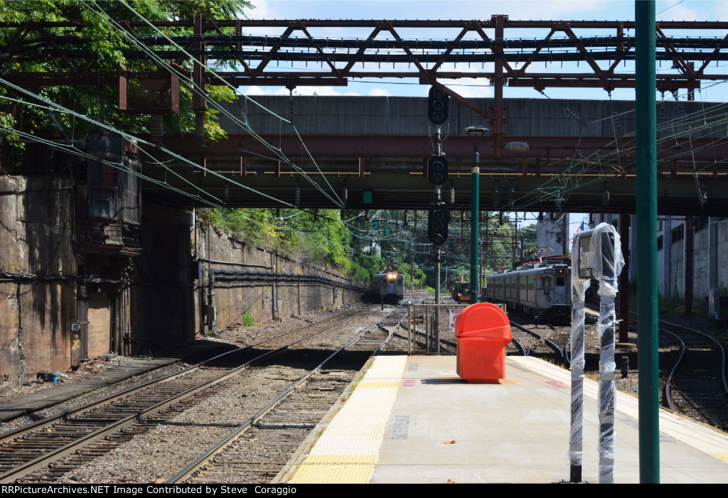 The  :45 PM Train to Hoboken approaches Summit Station 